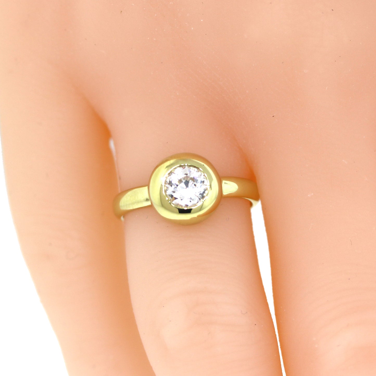 Sabel Round Brilliant Cut Diamond Bezel Set Engagement Ring